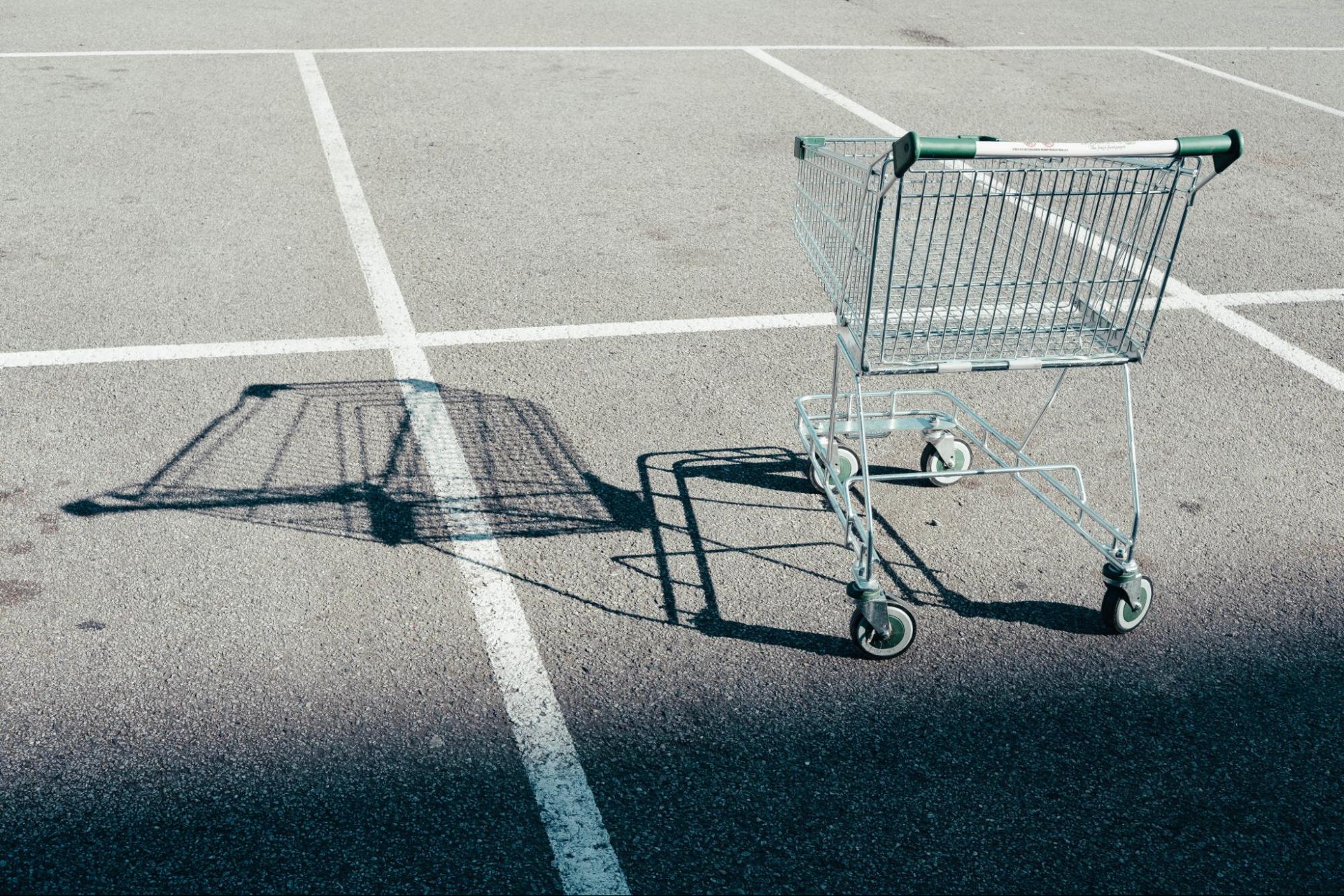 Shopping cart in a parking lot.